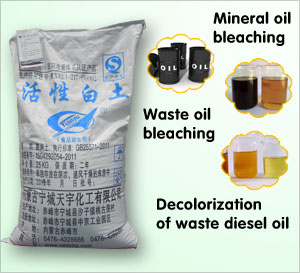 Decolorization of activated clay mineral oil